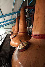 The large stills at Laphroaig Distillery on the island of Islay, Scotland